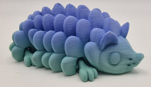 Colourful 3D-printed hedgehog fidget gift