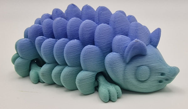 Colourful 3D-printed hedgehog fidget gift